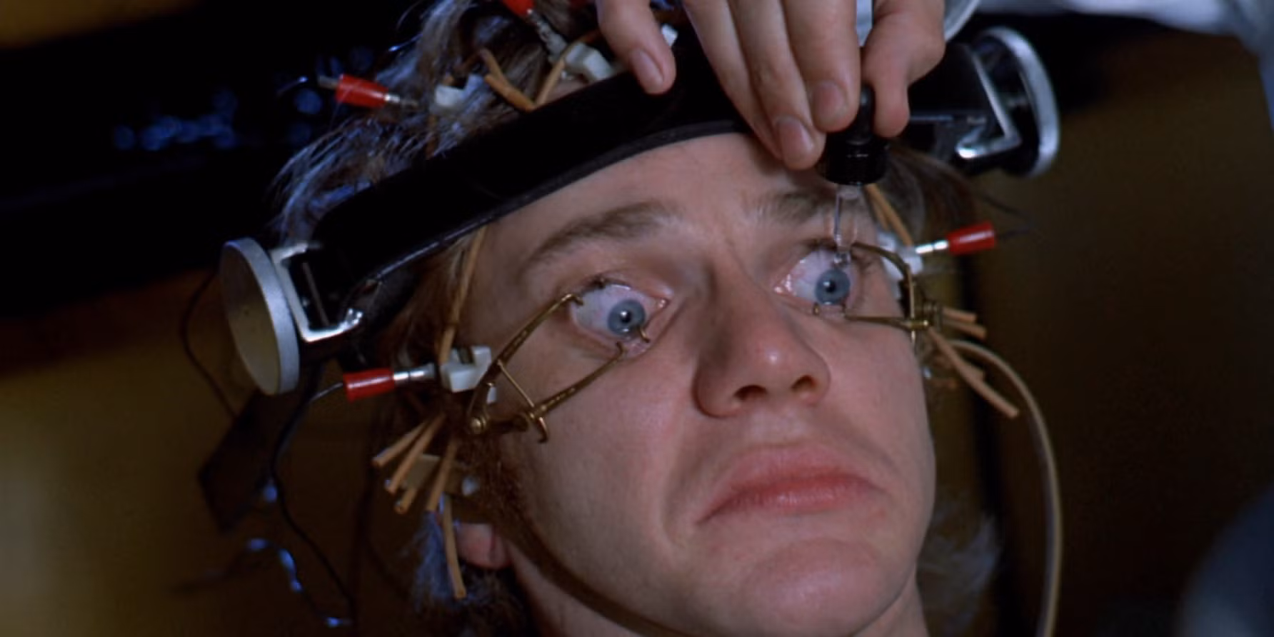 The ending scene from Clockwork Orange when Alex is forced to watch propoganda